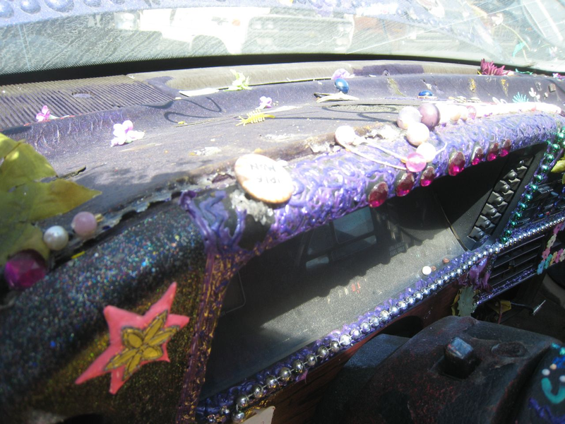Illustration for article titled Groovalicious Purple Princess Of Peace Art Car Falls On Hard Times, Faces Crusher